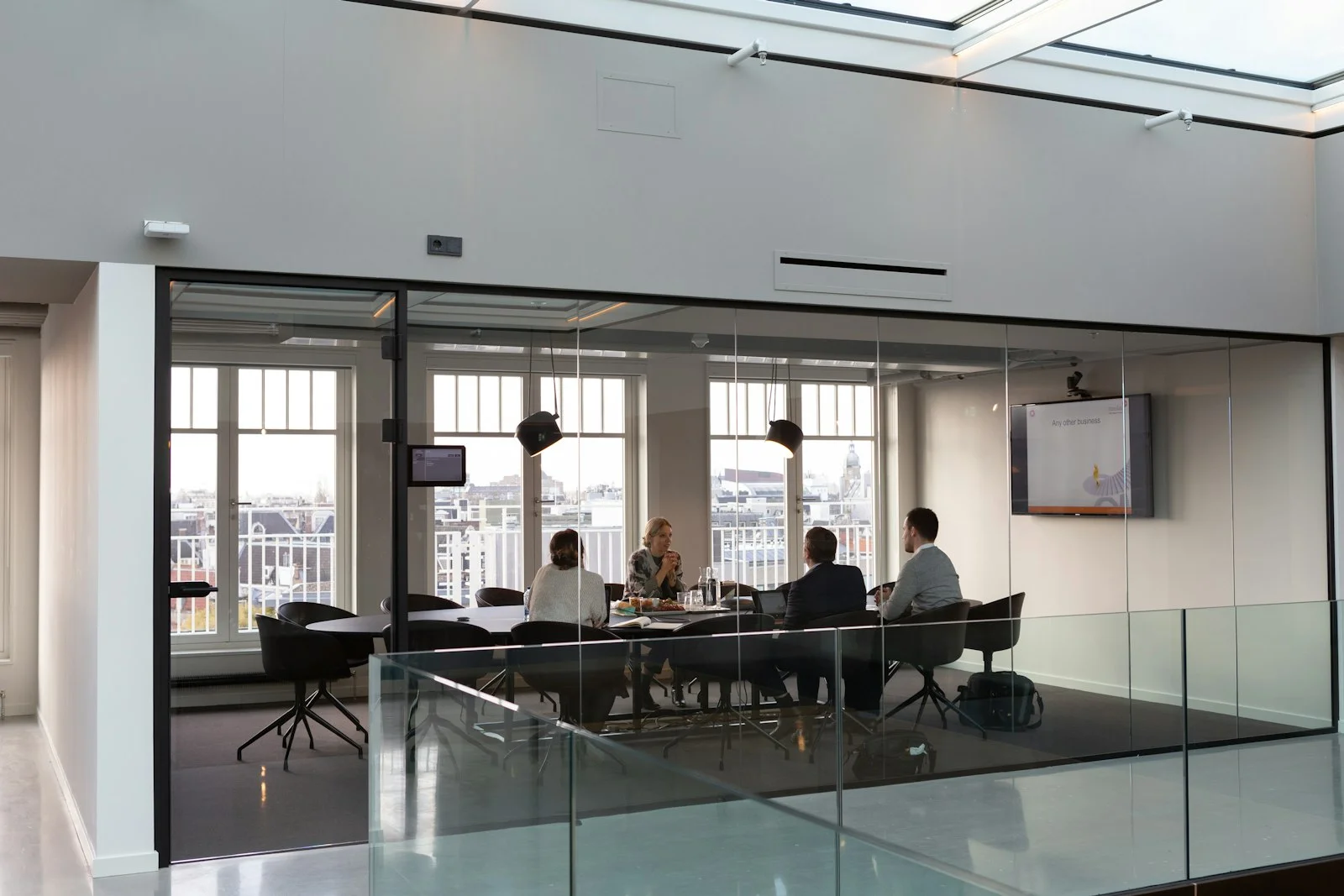 people sitting on chair inside building people sitting on chair inside building